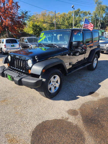 2013 Jeep Wrangler Unlimited for sale at Johnny's Motor Cars in Toledo OH