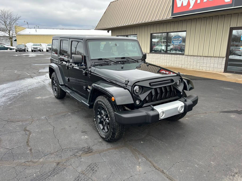 2015 Jeep Wrangler Unlimited for sale at Wyrick Auto Sales & Leasing Inc in Holland, MI