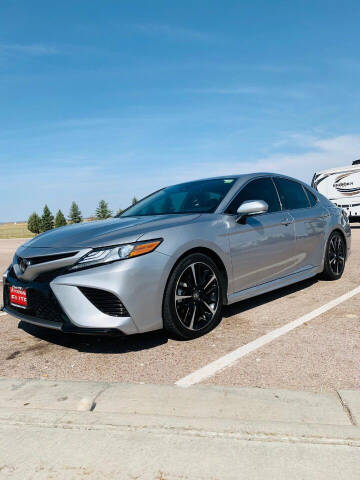 2019 Toyota Camry for sale at KHAN'S AUTO LLC in Worland WY