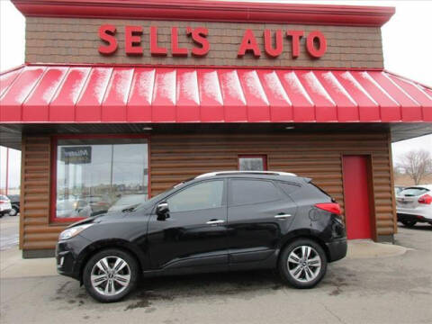 2014 Hyundai Tucson for sale at Sells Auto INC in Saint Cloud MN