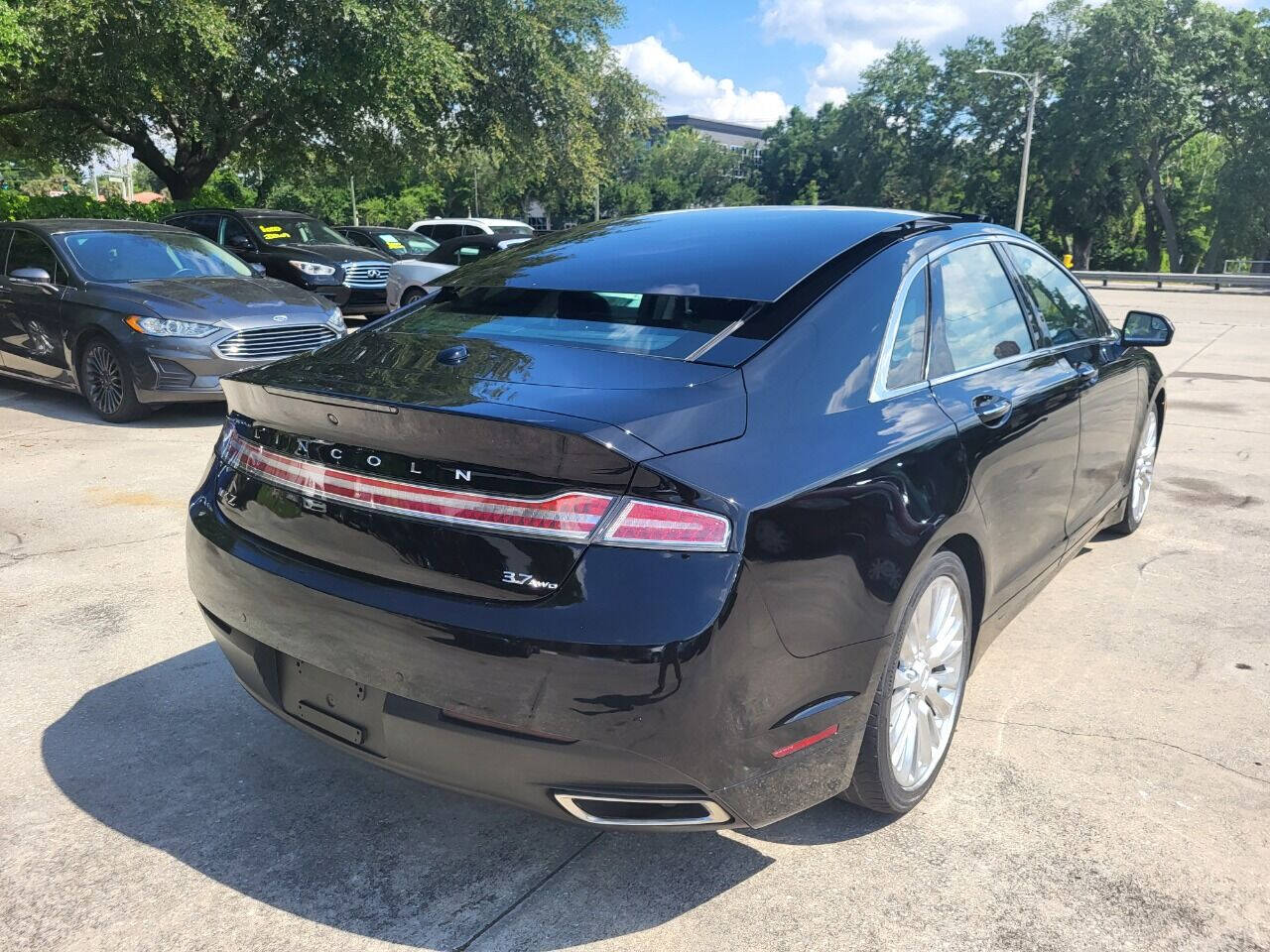 2016 Lincoln MKZ for sale at FAMILY AUTO BROKERS in Longwood, FL