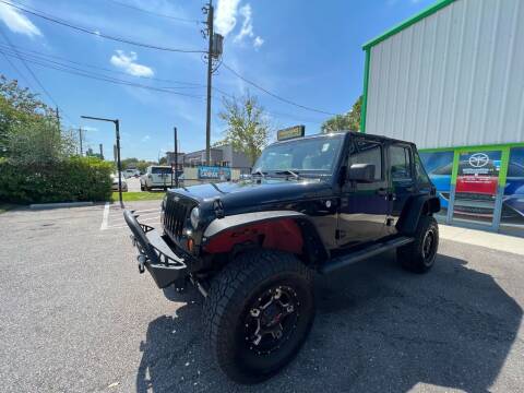 2011 Jeep Wrangler Unlimited for sale at Bay City Autosales in Tampa FL
