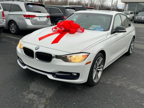 2014 BMW 3 Series for sale at Charlotte Auto Group, Inc in Monroe NC