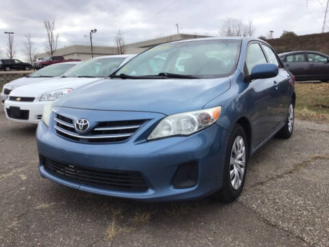 2013 Toyota Corolla for sale at Sparkle Auto Sales in Maplewood MN