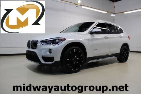 2016 BMW X1 for sale at Midway Auto Group in Addison TX