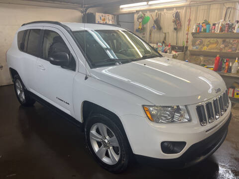 2011 Jeep Compass for sale at BURNWORTH AUTO INC in Windber PA