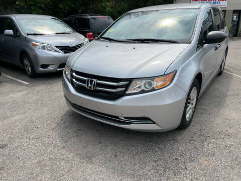 2014 Honda Odyssey for sale at Charlie's Auto Sales in Quincy MA