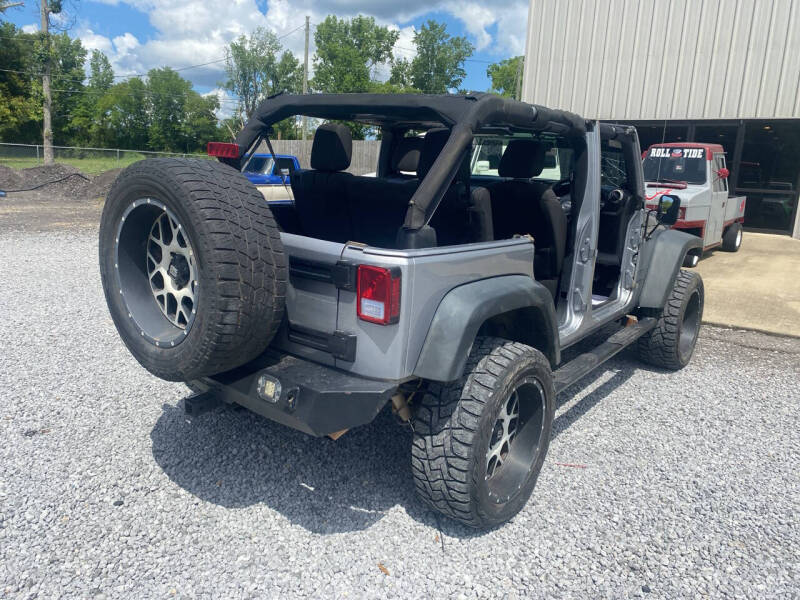 Used 2014 Jeep Wrangler Unlimited Sport with VIN 1C4BJWKG3EL293515 for sale in Odenville, AL