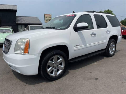 2012 GMC Yukon for sale at HUFF AUTO GROUP in Jackson MI