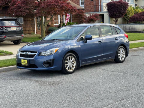 2012 Subaru Impreza for sale at Reis Motors LLC in Lawrence NY