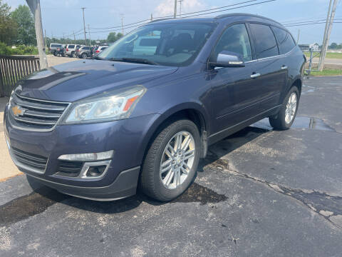 2014 Chevrolet Traverse for sale at HEDGES USED CARS in Carleton MI