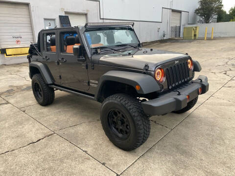 2017 Jeep Wrangler Unlimited for sale at Legacy Motor Sales in Norcross GA