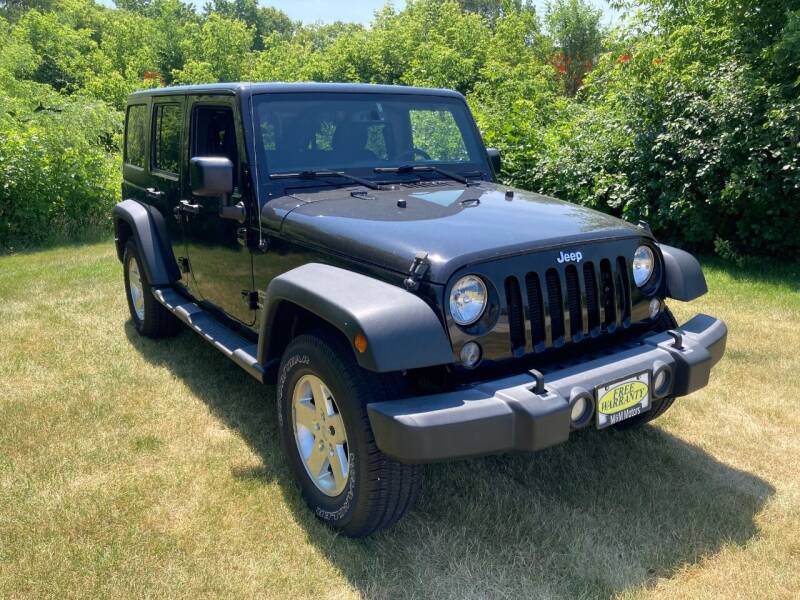 2016 Jeep Wrangler Unlimited for sale at M & M Motors in West Allis WI