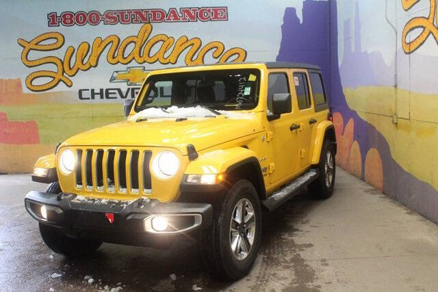 Used 2021 Jeep Wrangler Unlimited Sahara with VIN 1C4HJXEN3MW724412 for sale in Grand Ledge, MI