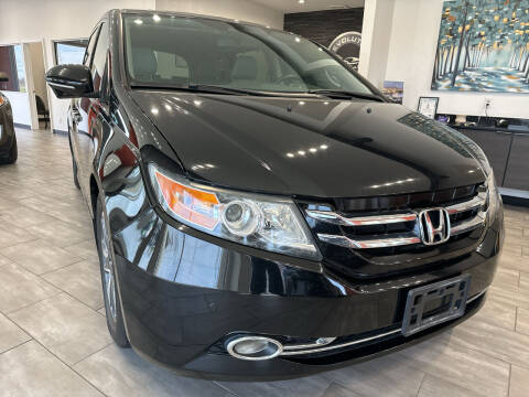 2014 Honda Odyssey for sale at Evolution Autos in Whiteland IN
