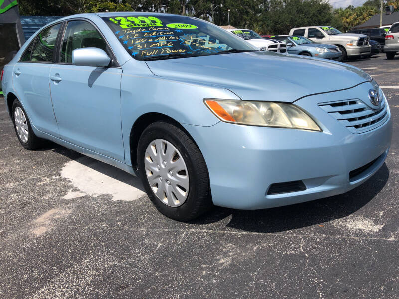 2009 Toyota Camry for sale at RIVERSIDE MOTORCARS INC - Main Lot in New Smyrna Beach FL