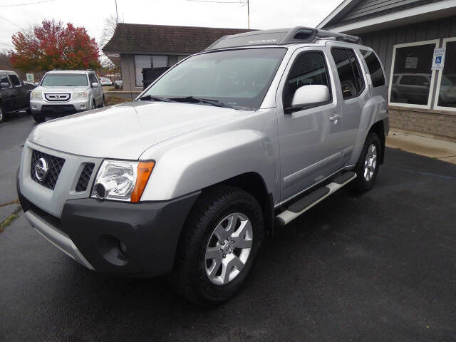 2010 Nissan Xterra for sale at Lakeshore Autos in Holland, MI