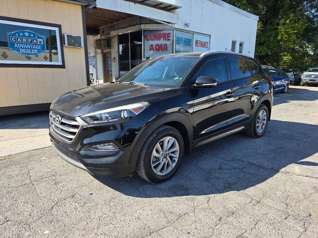 2016 Hyundai TUCSON for sale at DAGO'S AUTO SALES LLC in Dalton, GA