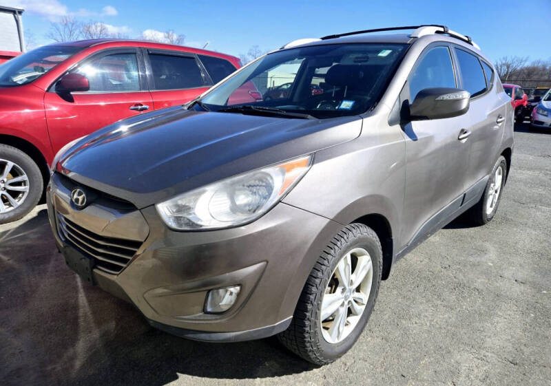 Used 2013 Hyundai Tucson GLS with VIN KM8JUCAC6DU714910 for sale in Westfield, MA