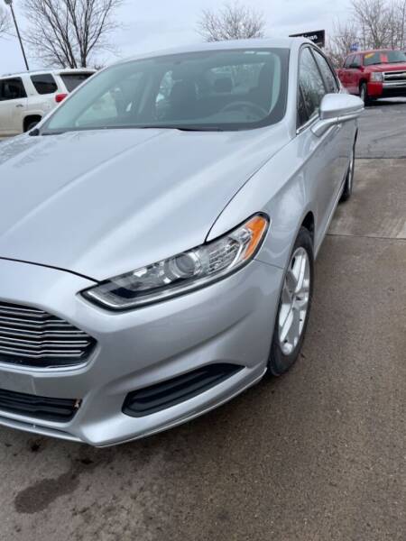 2014 Ford Fusion for sale at Louie & John's Complete Auto Service Dealership in Ann Arbor MI