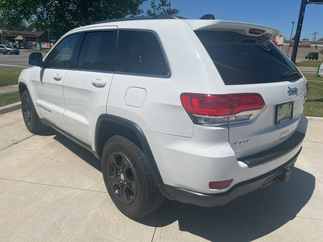 2014 Jeep Grand Cherokee for sale at ORCHARD LAKE AUTO SALES INC in Farmington Hills, MI