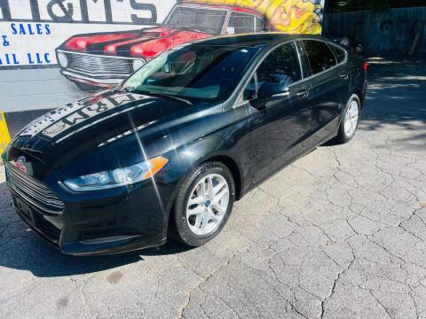 2014 Ford Fusion for sale at M&M's Auto Sales & Detail in Kansas City KS