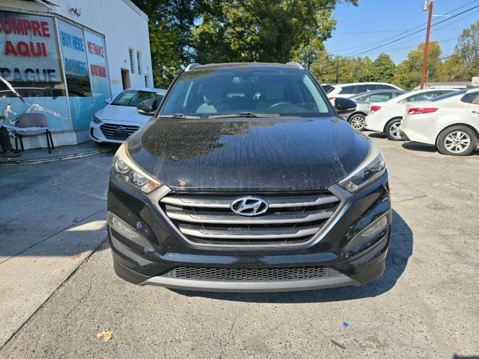 2016 Hyundai TUCSON for sale at DAGO'S AUTO SALES LLC in Dalton, GA