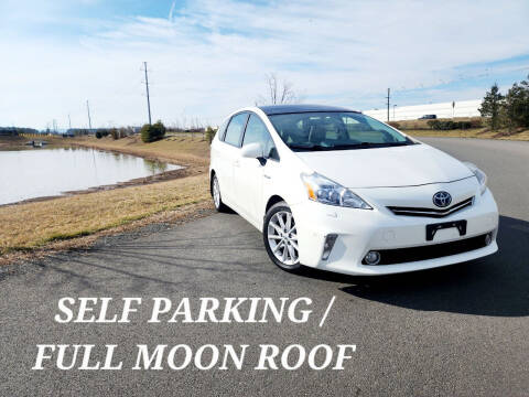 2013 Toyota Prius v for sale at BOOST MOTORS LLC in Sterling VA
