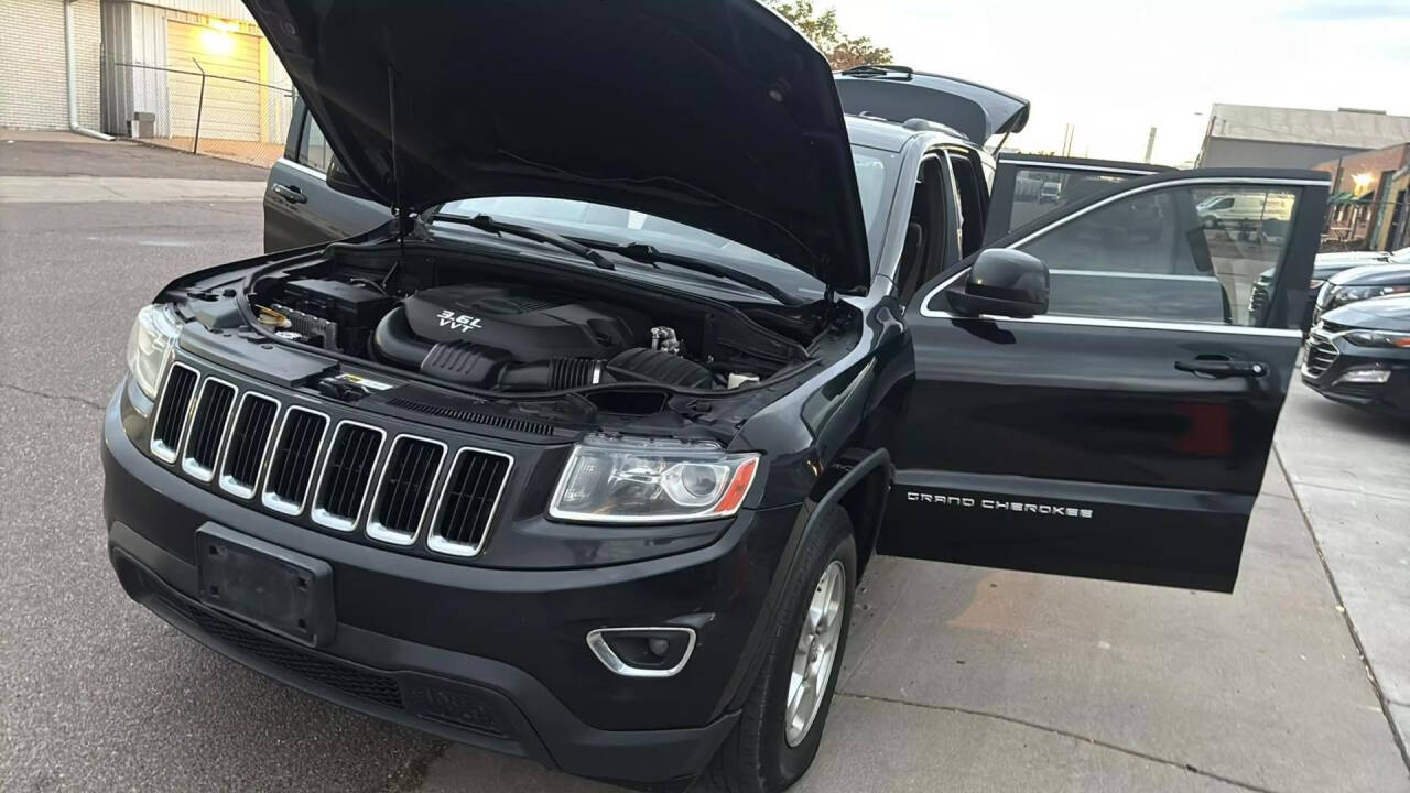 2014 Jeep Grand Cherokee for sale at Ganda Auto Sales in Denver, CO