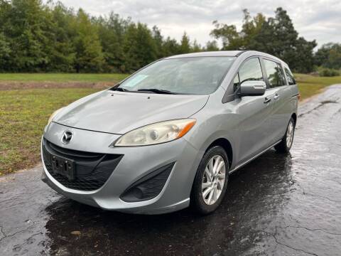 2014 Mazda MAZDA5 for sale at Russell Brothers Auto Sales in Tyler TX