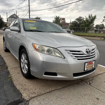 2007 Toyota Camry for sale at A & J AUTO GROUP in New Bedford MA