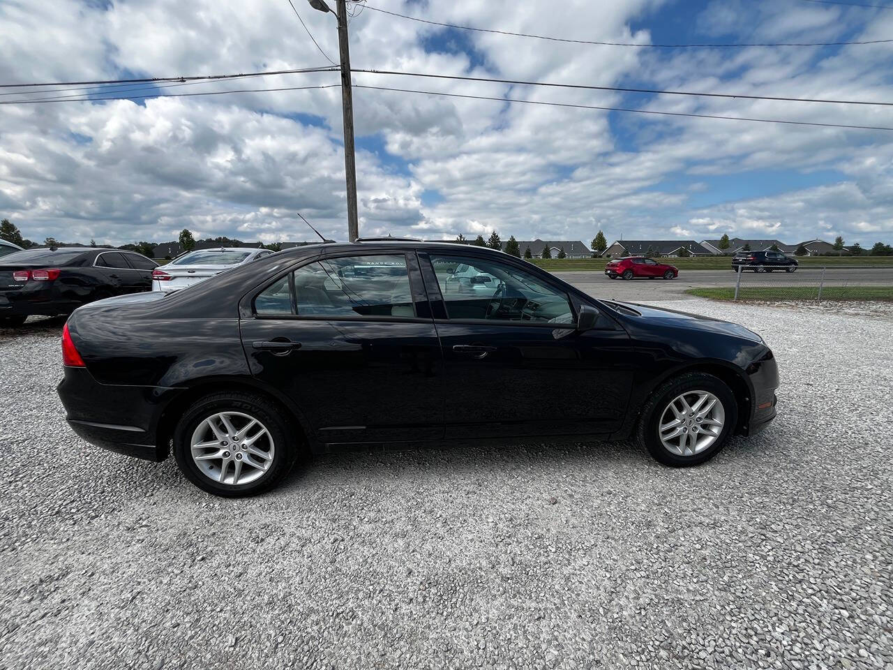 2012 Ford Fusion for sale at Quartz Auto Sales in Indianapolis, IN