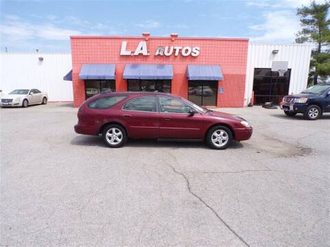 2004 Ford Taurus for sale at L A AUTOS in Omaha NE