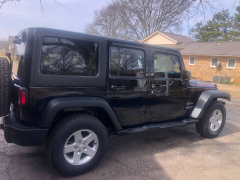 2016 Jeep Wrangler Unlimited for sale at HICKS AUTO SALES in Moulton AL