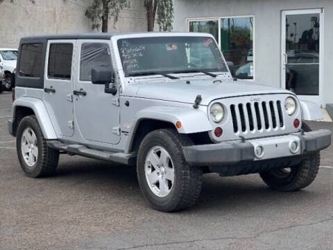 2012 Jeep Wrangler Unlimited for sale at Adam's Cars in Mesa AZ