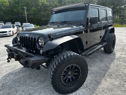 2014 Jeep Wrangler Unlimited for sale at Gwinnett Luxury Motors in Buford GA