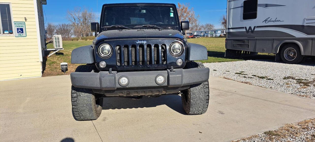 2014 Jeep Wrangler Unlimited for sale at CORNMAN AUTO LLC in Kirksville, MO