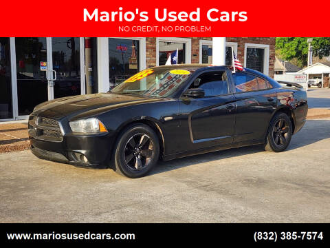 2014 Dodge Charger for sale at Mario's Used Cars - South Houston Location in South Houston TX