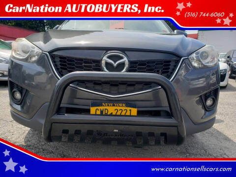 2014 Mazda CX-5 for sale at CarNation AUTOBUYERS Inc. in Rockville Centre NY