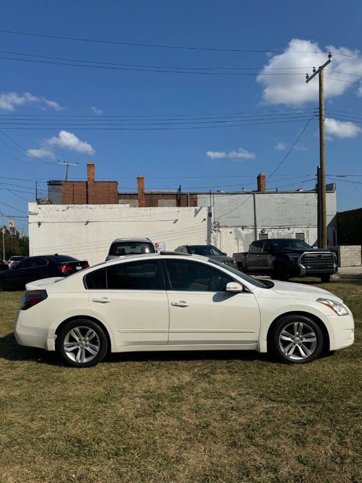 2012 Nissan Altima for sale at H & H AUTO GROUP in Detroit, MI