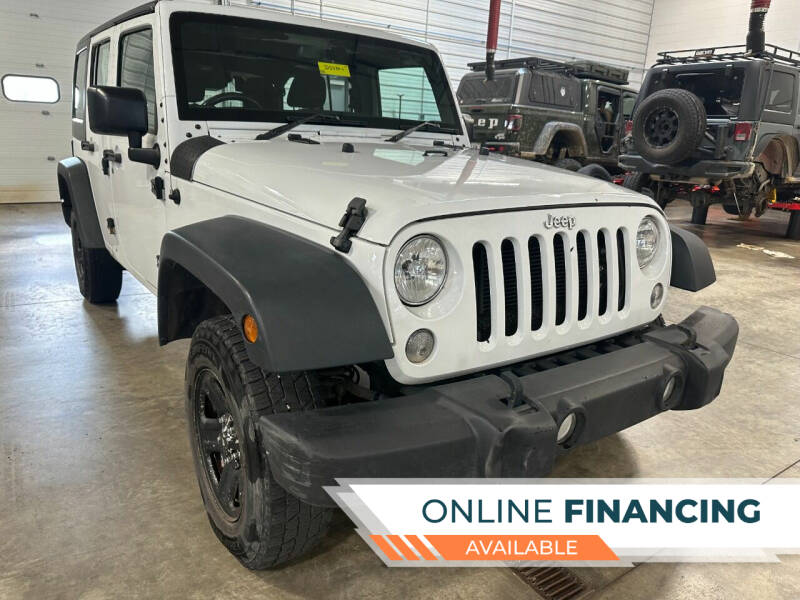 2016 Jeep Wrangler Unlimited for sale at Postal Pete in Galena IL