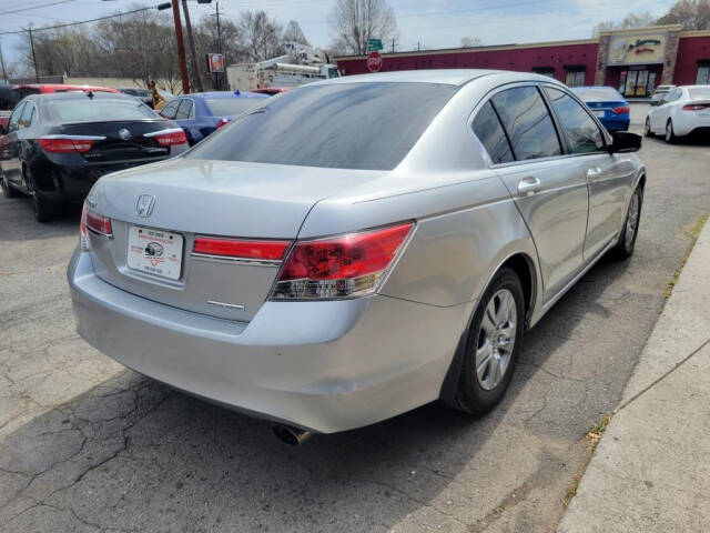 2012 Honda Accord for sale at DAGO'S AUTO SALES LLC in Dalton, GA