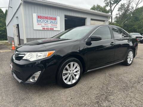 2012 Toyota Camry for sale at HOLLINGSHEAD MOTOR SALES in Cambridge OH