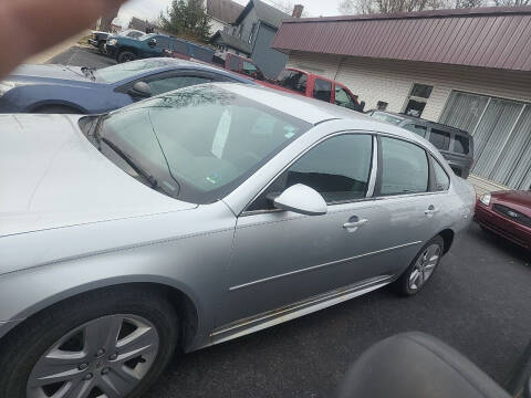 2010 Chevrolet Impala for sale at Maximum Auto Group II INC in Cortland OH