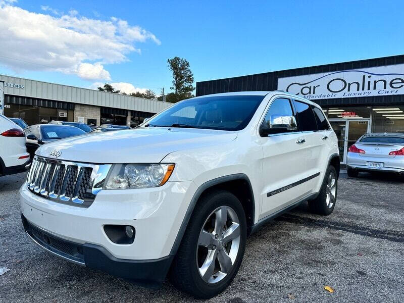 2011 Jeep Grand Cherokee for sale at Car Online in Roswell GA