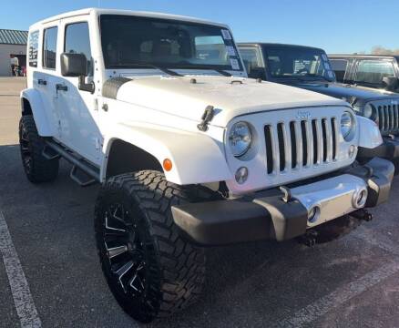2016 Jeep Wrangler Unlimited for sale at Dixie Motors Inc. in Northport AL