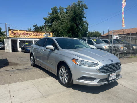 2017 Ford Fusion Hybrid for sale at AUTCO AUTO SALES in Fresno CA