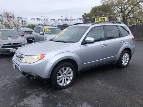2013 Subaru Forester for sale at C J Auto Sales in Riverbank CA