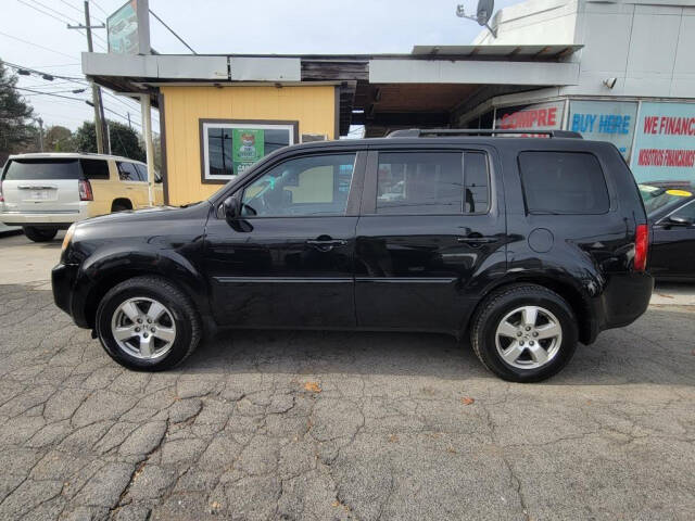 2011 Honda Pilot for sale at DAGO'S AUTO SALES LLC in Dalton, GA