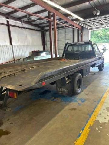 1989 Ford F450 Super Duty flatbed Towing